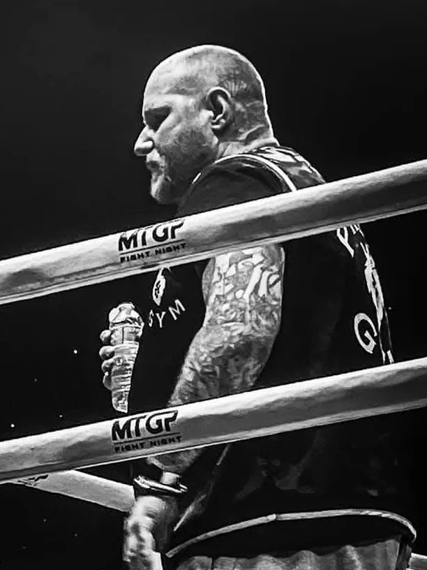 Dale Joel, head coach at Pride Gym Sheffield, in the corner at an MTGP fight night